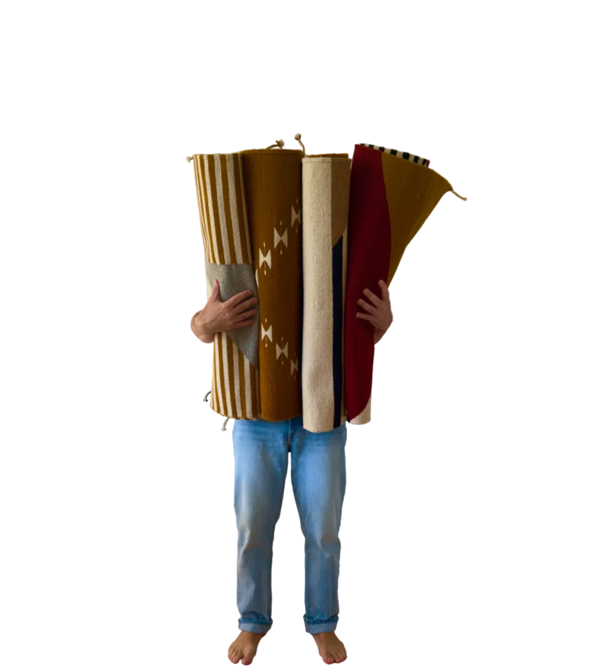 Person holding 4 rollers up handmade wool rugs