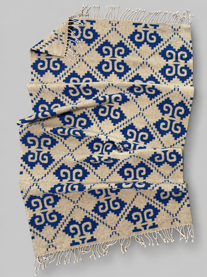 Handmade wool rug using natural and Indigo dyed wool. made by hand by Zapotec in Oaxaca, Mexico